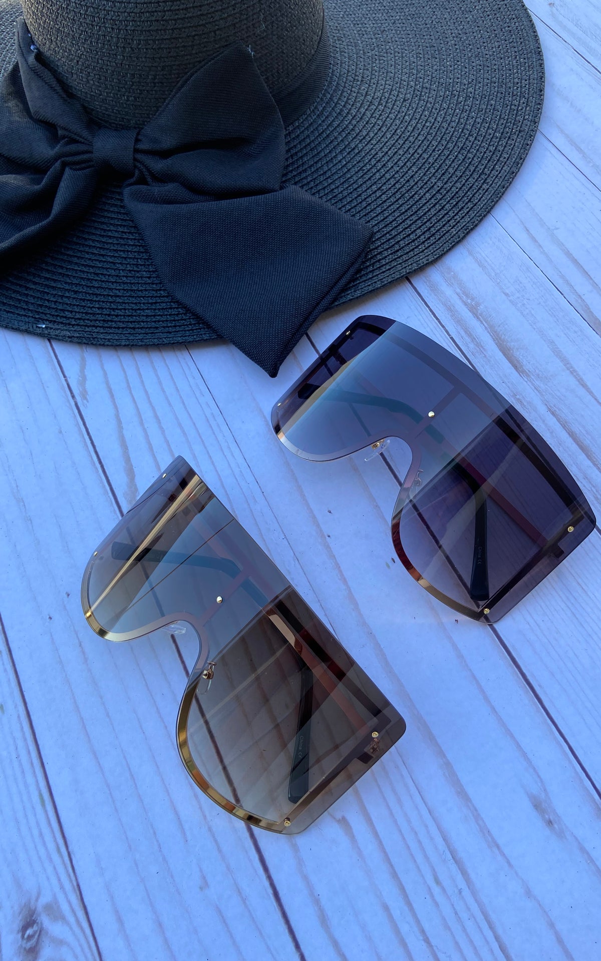Sunglasses: Frameless Oversized Sunnies